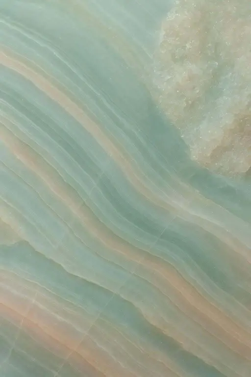A vertical 2:3 macro of an agate slab filling the frame with diagonal veins, translucent banding and crystalline pockets, shallow focus, and a calm sea-green palette.