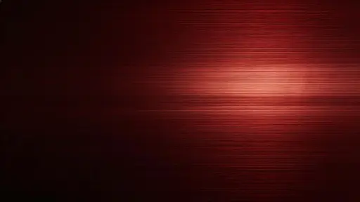 Widescreen 16:9 wallpaper of brushed red metal as a luxury product backdrop with steady grain, a soft off-center highlight band, deep maroon valleys and near-black edges reserved for icons.