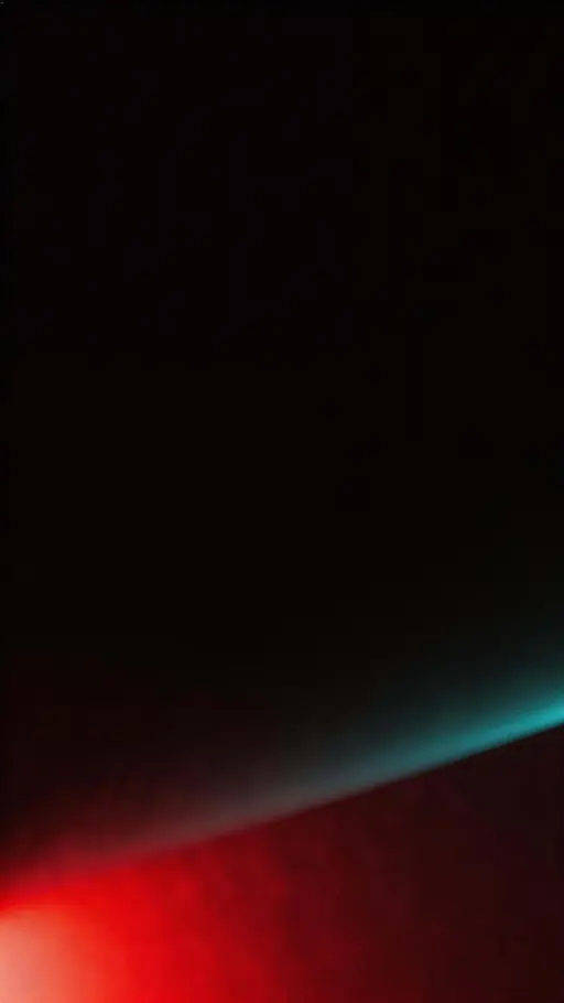 A 9:16 vertical wallpaper where a deep crimson glow rises diagonally from the lower third into near-black, fading through wine and maroon with a cyan-teal fringe, soft bloom, thin haze, and fine film grain for a premium, spacious feel.