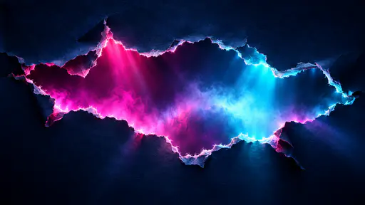 A large sheet of dark blue paper is torn open in the middle like a jagged window with magenta and cyan light pouring through and white fibres glowing along the rim.