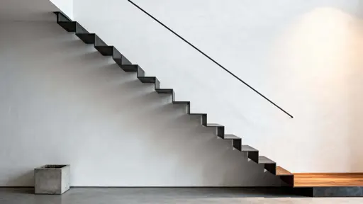 A minimalist architectural study of floating stairs in a 16:9 frame, showing calm geometry, neutral light, and crisp material transitions for design reference and visualization.