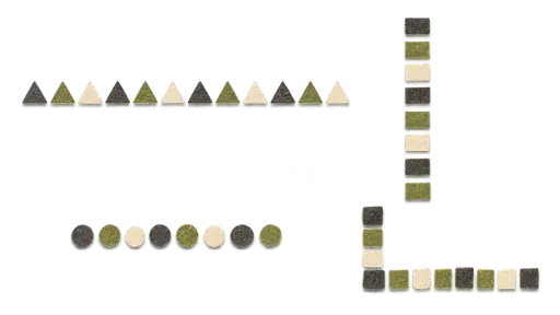 Four matching decorative separators made of small torn paper shapes, a long row, a short row, a tall vertical stack and a corner piece, on a transparent background.