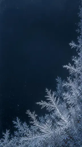 Macro of feathery frost crystals advancing from the lower-right of a midnight-blue window pane, most of the glass left untouched and dark.