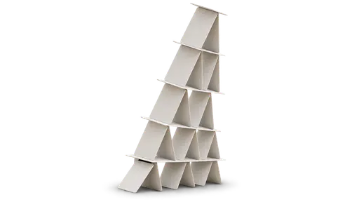 A house of cards: a tall blank-card tower leaning visibly sideways, one foundation card slid halfway outward with a clear gap while every tier above tilts downhill, isolated on transparency with a soft contact shadow.