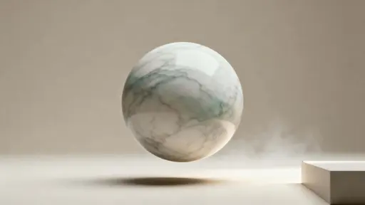 A single soft-edged marble form floats midair within a 16:9 frame, lit to reveal faint veins and satin surfaces while the scene reads as calm, refined, and minimalistic decor imagery.