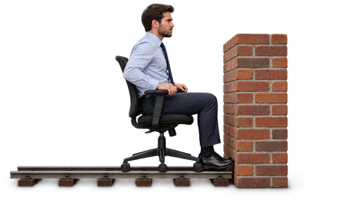 Hitting a brick wall: a rolling office chair carrying a seated worker with its front casters pressed against the base of a freestanding brick wall where a short rolling track ends, isolated on transparency with a soft contact shadow.