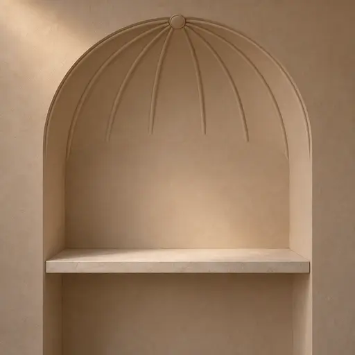 Photorealistic halloween retail display background: a softly arched niche with pumpkin-rib molding built into a warm clay wall, holding one clean empty stone shelf as an unobstructed product zone beside a plain wall copy zone.
