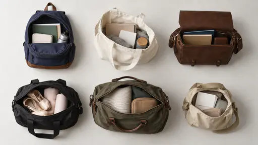 From directly above on a plain pale floor in even top light six different open bags sit in two neat rows, a school backpack, a canvas tote, a satchel, a dance bag, a weekender and a small canvas bag, each with its few contents showing at its opening and nothing spilling out.